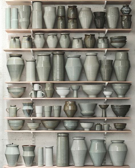 No matter how hard I try I can’t stop myself from procrastinating and taking photographs like this. Assembled pots in greens, blues and greys, vessels compiled over the past two years, from which I pick and choose pieces from for shop restocks and exhibitions. What I really need is a clean room, washed white with stillages slotted along one wall to store all these pots in, that’s another feature my dream, future studio will have. I think about the future a lot. Where will this workshop be? T... Shop Pottery, Ceramic Serveware, Studio Pottery, Pottery Studio Shelves, Pottery Studio Glaze Storage, Ceramic Kitchenware, Pottery Studio Architecture, Pottery Storage Jars, Hand Made Ceramic Jar