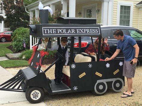 Entry in golf cart parade, July 2016: See blog for details:  http://diannescards.com/2016/07/04/polar-express-wins/ Utv Parade Float Ideas, Christmas Parade Golf Cart, Golf Cart Train Decoration, Polar Express Golf Cart Parade, Golf Cart Christmas Lights, Golf Cart Float Ideas, Christmas Golfcart Decorations, Holiday Float Parade Ideas, Polar Express Christmas Float