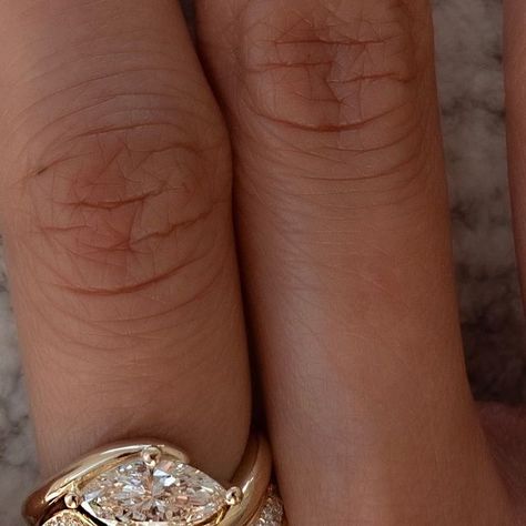 CADETTE on Instagram: "Champagne SET 🥂💍 Our signature Marquise Rapture Ring, customized with a dreamy 1CT Champagne natural diamond. Stacked seamlessly with the matching Bold Pavé Rapture Band. A true match made in Heaven.  — A Champagne Diamond is a natural diamond with a visibly brown or yellowish undertone. They can range from very light golden, honey or peachy hues, to deeper cognac or chocolatey hues. This is Mother Nature doing her thing, in a breath-taking way. A champagne diamond makes for a stunning choice for those who want a timeless, natural diamond, but with a uniquely soulful warmth and nuance to it. #cadettejewelry #cadettebridal #champagnediamonds" Champagne Moissanite, Champagne Moissanite Engagement Ring, Champagne Marquise Diamond Ring, Engagement Rings Champagne Diamond, Champagne Diamonds Engagement, Colored Engagement Rings, Made In Heaven, Champagne Color, Champagne Diamond