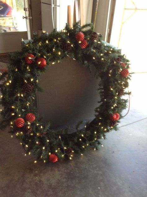 A Giant Christmas Wreath | Hometalk Christmas Garland On Gates, Large Outdoor Christmas Wreaths On House, Oversized Wreath Christmas, Wreath Above Garage, Diy Big Wreath Christmas, Diy Giant Outdoor Christmas Wreath, Giant Christmas Wreaths, Giant Wreath On House, Diy Giant Christmas Wreath