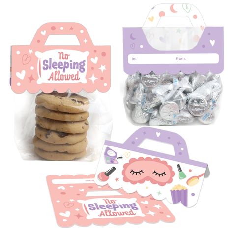 "Delight your guests when you use the set of 24 Pajama Slumber Party Candy Bags with Toppers to add a little DIY magic to your Girls Sleepover Birthday Party favors! Adorable and easy to use, this goodie kit includes food-safe clear treat bags and scalloped-edge topper labels with a built-in handle that come in 2 designs. Candy labels are professionally printed double-sided on sturdy cardstock paper and include a to and from section on the back for easy personalization. To use Pajama Slumber Par Sleepover Goody Bag Ideas, Sleepover Birthday Party, Party Candy Bags, Candy Bag Toppers, Girls Slumber Party, Sleepover Birthday, Diy Girls, Sleepover Birthday Parties, Girl Sleepover