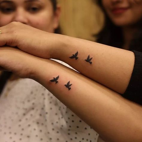 Two Swallows Tattoo Small, Two Small Birds Tattoo Simple, Small Bird Wrist Tattoos For Women, Sister Tattoos Birds, Bird Sister Tattoo, 2 Birds Flying Tattoo, 2 Birds Tattoo Small, Two Birds Tattoo Design, Small Bird Wrist Tattoo