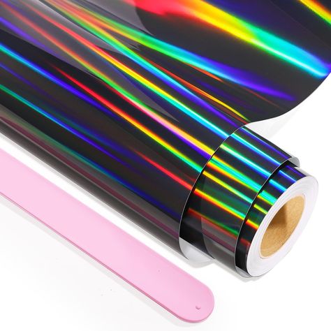 PRICES MAY VARY. SHINY HOLOGRAPHIC VINYL : The feature of black holographic vinyl is that it can gradually turn into a rainbow color at different angles and light. As a high gloss metallized vinyl, it is waterproof and will not peel off even after multiple washes. MAGICAL COLOR : Our holographic black vinyl is rich in color and easy to use, making it an ideal gift for family or friends for New Year, Christmas, anniversaries, and more. It will be used to help create personalized crafts and DIY pr Holographic Black, Personalized Crafts, Black Holographic, Vinyl Roll, Holographic Vinyl, Crafts And Diy, Vinyl Rolls, Diy Cups, Rainbow Color