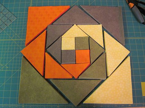 good tut---snail trail or monkey wrench- need equal amounts 32inches of 4 fabrics to make 16 blocks- 48 inch square. 3-7/8" squares - cut twice on diagonal 4-1/4" squares - cut once on diagonal 6-7/8" squares - cut twice on diagonal 7-1/4" squares - cut once on diagonal Try solids with random highlights Random Highlights, Monkey Wrench Quilt, Snail Trail, Quilt Blocks Easy, Monkey Wrench, Quilt Block Patterns Free, Quilt Square Patterns, Quilt Border, Star Quilt Blocks