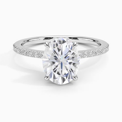 Moissanite Ballad Hidden Floral Halo Diamond Engagement Ring - 18K White Gold. This design-forward ring features a sleek, pavé diamond band for a simple top-down look. When tilted, however, a showstopper is revealved: a hidden halo of marquise diamonds that, when viewed from the buttom up, forms the shape of a shimering flower (1/3 total carat weight). Oval Shaped Engagement Rings, Classic Engagement, Engagement Ring Shapes, Engagement Rings Platinum, Lab Grown Diamonds Engagement, Classic Engagement Rings, Hidden Halo, Halo Diamond Engagement Ring, Custom Engagement Ring