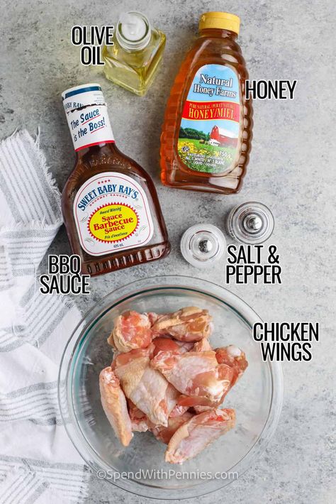 These sweet honey BBQ wings are the meal that the family has been waiting for. Cooked to crispy perfection in the air fryer, these chicken wings will be ready in no time. Then, once the sweet and sticky sauce has been added, it will be so hard to resist these delightfully addictive wings! #honeybbqwings #bakedhoneybbqwings #honeybbqchickenwings #spendwithpennies Honey Bbq Wings Air Fryer, Air Fryer Baked Chicken Wings, Bbq Chicken Wings In Air Fryer, Bbq Wings In Air Fryer, Chicken Wing Recipes Air Fryer, Honey Barbeque Wings, Barbeque Chicken Wings, Honey Barbeque Chicken, Honey Bbq Wings Recipe