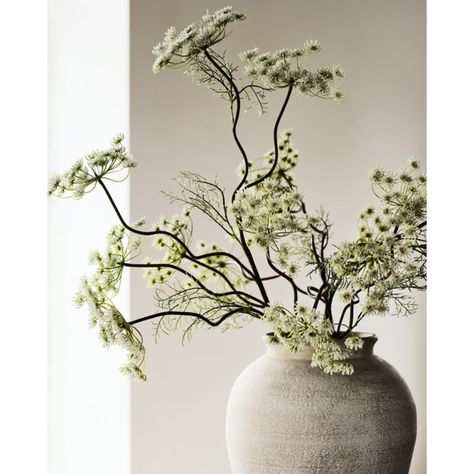 Master potters transform simple clay into an ethereal vase. Thrown, finished and painted by hand, the terracotta vessel features a textured surface enhanced by stippled washes of white and cream. The graceful curves of the vase swell from the base to shape a classic urn silhouette. Display our exclusive Ophelia large white vase on a mantel or sideboard where its artistry can be appreciated, or place it on the floor to present tall botanicals.     Hand-thrown, -finished and -painted  Terracotta Entryway Flower Arrangements, Large Floor Vase Arrangements, Winter Vase Decor, Rustic Vases Decor, Eucalyptus Vase Decor, Dining Table Riser Centerpiece, Large Vase With Branches, Large Branches In Vase, Long Dining Table Centerpiece