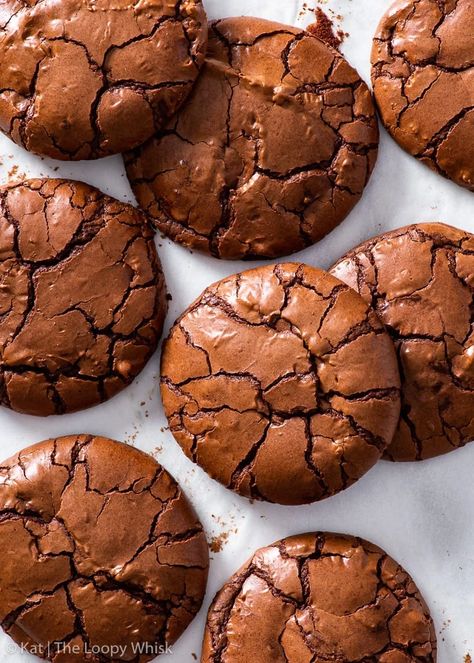 The Ultimate Chocolate Brownie Cookies - These are THE BEST (and the easiest!) chocolate brownie cookies you’ll ever make. They’re perfectly gooey, fudgy and intensely chocolatey, and you need just 7 ingredients and about half an hour to make them! Plus, they’re flourless and therefore the perfect gluten free dessert (but they’ll be a hit with absolutely everyone). Chocolate cookies. Easy cookie recipes. Gluten free cookies. Gluten free desserts. Gluten free recipes. Cookie Recipes Gluten Free, Ultimate Chocolate Brownies, The Loopy Whisk, Loopy Whisk, Cookies Sans Gluten, Gluten Free Chocolate Cookies, Flourless Chocolate Cookies, Cookies Cupcake, Flourless Cookies