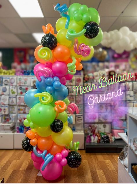 Neon balloon garland  comes in 5in,11in, 18in Neon colors  Comes with Latex printed balloons and a  mix of balloons and 260 balloons   The 260 balloons (long balloons)   come in different neon colors. * Balloons glow in dark  * Outside/ Inside use  ** We recommend our electric pump to blow our balloons, we also recommend the hand pump to make Balloon  swirls* 4ft Balloon Garland  7ft Balloon Garland  9ft Balloon Garland ( the height is like photo)  12ft Balloon Garland Neon Ballons Decoration, Dark Balloon Garland, Colors Theme Party, 80s Balloons, Neon Balloon Garland, Neon Balloon Arch, 260 Balloons, Neon Balloons, Cheers Theme