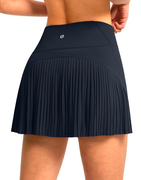 PRICES MAY VARY. Lightweight, Sweat-wicking: Outer layer on this tennis skirt is made of light and breathable fabric, wicks moisture well when sweating, also makes a flowy appearance. Pleated Design & High-rise: Features flattering pleats at back and structured a-line silhouette. Elastic wide waistband provide tummy control which cinches your waist for a slimming and cute look. Soft Built-in Shorts: 5" inseam shorts underneath, long and soft enough to offer a comfortable fit with modest full cov Pleated Golf Skirt Outfit, Golf Skirt Outfit Casual, Tennis Skirt And Sweatshirt, Tennis Skirt Pattern, Tennis Skirt Outfit Street Style, Skirt Outfit Casual, Skort Outfit, Golf Skorts, Athletic Skirts