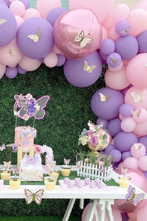 Take a look at this pretty butterfly birthday party! Love the balloon garland! See more party ideas and share yours at CatchMyParty.com Pink And Purple Butterfly Birthday Party, Aesthetic Butterfly Birthday Party, Decorating Ideas For The Birthday, 1st Bday Decoration Ideas Girl, 1 Birthday Decoration Ideas Girl, 1 Year Birthday Party Ideas Butterfly, Butterfly Party Ideas 1st Birthday, Butterflies And Flowers Birthday Party, Butterfly Kisses Birthday Party