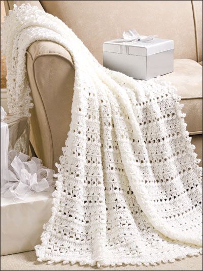 Quick and easy, this lacy afghan will be treasured by any happy couple. This e-Pattern was originally published in Crochet World June 2009. Size: 45" x 62". Made with medium (worsted weight) yarn and size I/9/5.5mm needles. Skill Level: Intermediate Wedding Afghan, Crotchet Blankets, Blankets To Crochet, Crochet Presents, Wedding Crochet, Crochet Throws, Modern Crochet Blanket, Crochet Throw Pattern, Crochet Pattern Instructions