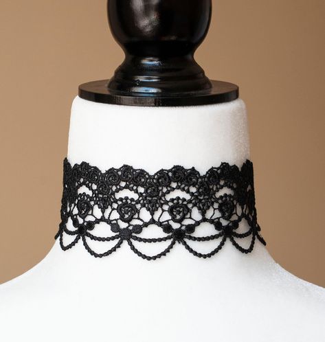 - This delicate choker is made from beautiful black lace - The choker closes at the back with a lobster claw clasp - One size fits most, the length can be adjusted with the 2.5 inch extension chain - The choker is approximately 2 inches wide and 12 inches long SHIPPING: Default shipping is by regular mail, which does not have tracking, shipping times are as follows: US: 1-3 weeks Canada: 1-2 weeks Europe: 2-4 weeks If you would like to add tracking for your parcel, please upgrade to Expedited Pa Black Lace Choker Necklace, Delicate Choker, Black Lace Choker, Lace Choker Necklace, Gothic Chokers, Lace Choker, Gothic Clothes, Necklace Elegant, Victorian Gothic