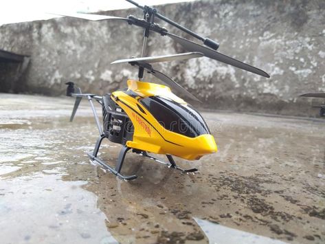 Photo about yellow black helicopter toy childrens. Image of helicopter, yellow, childrens - 145081558 Black Helicopter, Toy Helicopter, Helicopter Toy, Fitness Art, Photo To Cartoon, Snow Shovel, Yellow And Black, Yellow Black, Helicopter