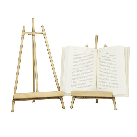 PRICES MAY VARY. TRADITIONAL THEME: A classic and timeless style and design for your traditional home setting MADE OF METAL: Iron gives these easel stands solid and durable forms GOLD MATTE FINISH: Metallic gold finish highlights each of this easel stand FEATURES TRIPOD LEGS EASEL: A wide lower handle with elevated front rim provides secure support for canvas or other displays 2 PIECES SMALL SIZE: This item measures 7.85L x 7.85W x 13.40H, 6.95L x 4.90W x 10.85H inches, and weighs 1.51 lbs Table Easel, Metal Easel, Display Easel, Easels, Table Top Display, Antique Farmhouse, Working Area, Traditional House, Traditional Design