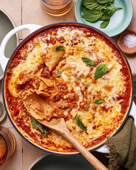 A pan of the high protein skillet lasagna, sitting on a countertop with a spoon resting inside of it Lazy Lasagna Recipe, Lazy Lasagna, Vegan Bolognese, One Pot Vegetarian, Skillet Lasagna, How To Make Lasagna, Vegetarian Lasagna, Crispy Cheese, Chicken Marinade