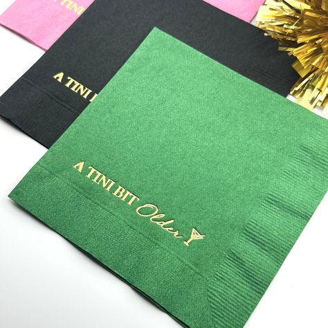 A Tini Bit Older Cocktail Napkin.  These napkins are perfect for a martini themed birthday party or as a gift for someone who loves martinis. Perfect for both him and her, these napkins serve as ideal decorations for a memorable Birthday Party. Crafted through a meticulous hot foil stamping process, these 3-ply 5x5 inch beverage napkins exude quality and vibrancy, making them the perfect addition to your birthday table decor. Key Features: Hot Foil Stamping: Our napkins are created through a hot foil stamping process, ensuring a high-quality and visually appealing design that stands out at the party. Variety of Colors: Choose from different colors of napkins and foils to match your party theme. Personalize your set with Gold, Rose Gold, or Silver foil accents. 3-Ply Beverage Napkins: These Chic Birthday Decorations, A Toni Bit Older, A Tiny Bit Older Party Theme, Apartment Party Ideas, Martini Themed Birthday Party, Tini Bit Older Bday Theme, Tini Birthday, A Tiny Bit Older Party, Tini Bit Older Decor