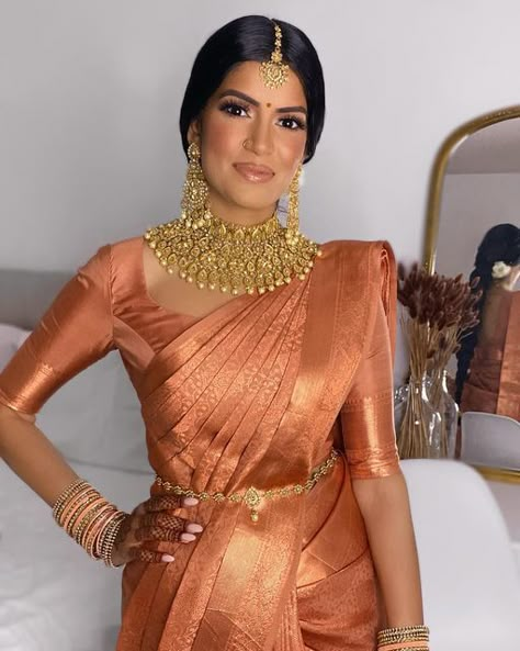 Toronto Makeup Artist on Instagram: "Absolutely radiant Dharshie, loved her @muhurtham__ saree that looked gorgeous in every single light. Couldn’t get enough of the terracotta & rose gold zari on her caramel complexion MUAH & Draping @imsylvie Saree @muhurtham__ Jewelry @mayasboutique Flowers @jasmineflorists . . . . . . . . . . . #torontomakeup #torontomakeupartist #torontomua #bridalmakeup #tamilmakeupartist #tamilmua #tamilbride #indianbride #southasianbride #tamil #weddingmakeupartis Anushree Reddy Lehenga, Bridal Jewelry Ideas, South Indian Bride Saree, Indian Dress Up, Engagement Saree, Indian Bride Makeup, Indian Wedding Gowns, Bridal Sarees South Indian, Mehendi Outfits