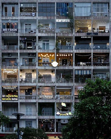 The Cafe Apartment / Vietnam This cafe apartment in vietnam is programed in abandoned building. If society wants to develop public safety or neighborhood, don't tare apart building just renovate it. #iiturbanism #week6 Cafe Apartment, Apartments Exterior, House Coffee, Building Photography, Old Apartments, New Architecture, Unique Buildings, The Cafe, Apartment Garden