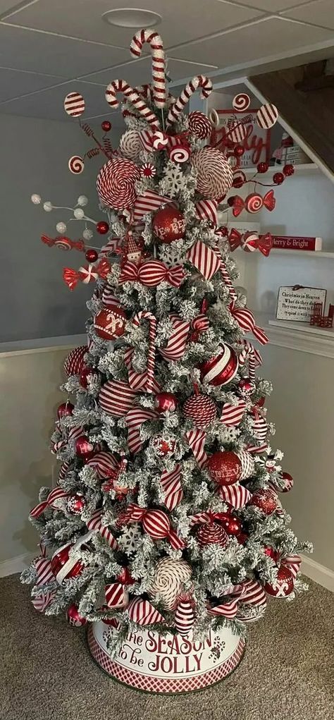 45+ Creative Christmas Tree Themes & Ideas for 2023 - HubPages Red Candy Christmas Tree, Candyland Christmas Tree Red And White, Christmas Tree Themes Peppermint, Christmas Decor Ideas Red White Silver, Candy Cain Christmas Tree, Christmas Tree Ideas Peppermint, Red Candy Cane Christmas Tree, Candycane Christmas Tree, Candy Cane Tree Theme