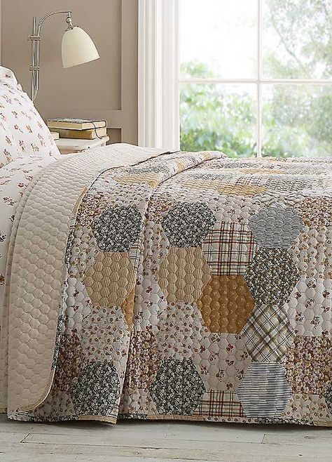 Layer your bed with a harmonious mix of floral stripes and checks with this printed patchwork design. Quilted for extra warmth, this bedspread adds comfort and infuses your sleeping space with a blend of patterns and textures.Brand: Catherine LansfieldTumble dry safeMachine washable100% Polyester Patchwork Bedspread, Catherine Lansfield, Floral Patchwork, Garden Bedding, Patchwork Designs, Floral Stripe, Bed Spreads, Bedroom Design, Checks