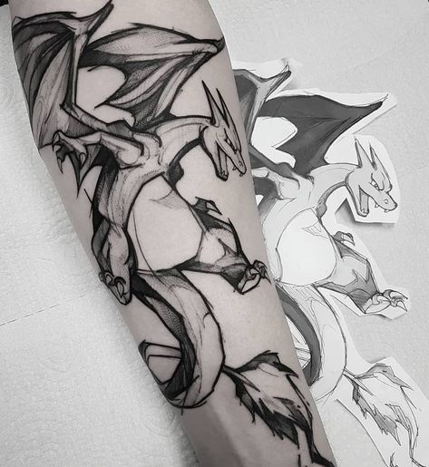 Follow @gamer.ink for more 😎 . 🔥 CHARIZARD 🔥 by @marquinhoandretattoo . If you want to see more , check artist page !!🤗 To submit your work… Black And Grey Pokemon Tattoo, Charizard Tattoo Design, Charizard Sketch, Mega Charizard X Pokemon, Rayquaza Tattoo, Charizard Drawing, Charmander Tattoo, Charizard Tattoo, Gengar Tattoo