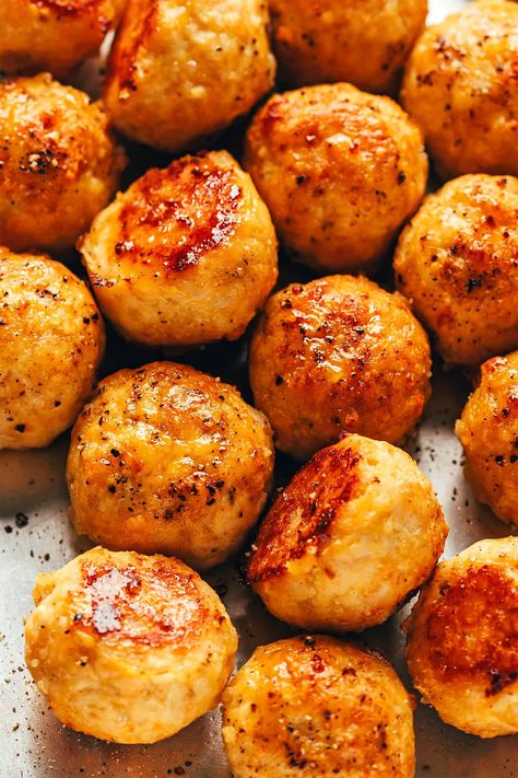 My go-to baked chicken meatballs recipe is easy to make, perfectly moist and tender, and customizable with your favorite seasonings. Serve with Italian marinara, Swedish gravy, Thai curry, Greek tzatziki, buffalo sauce, or whatever sounds best! | gimmesomeoven.com Italian Chicken Meatballs, Chicken Meatballs Recipe, Greek Tzatziki, Baked Chicken Meatballs, Chicken Milk, Chicken Balls, Chicken Meatball Recipes, How To Make Meatballs, Gimme Some Oven