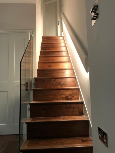 American Walnut stairs, bespoke glass balustrade with LED strip light under the hand rail and bespoke made light switch Hand Rail For Narrow Staircase, Narrow Staircase Lighting Ideas, Railing For Narrow Staircase, Narrow Staircase Handrail Ideas, Handrail For Narrow Staircase, Hand Rails For Stairs Indoor, Stair Hand Railing Ideas, Basement Handrail, Under Stair Lighting