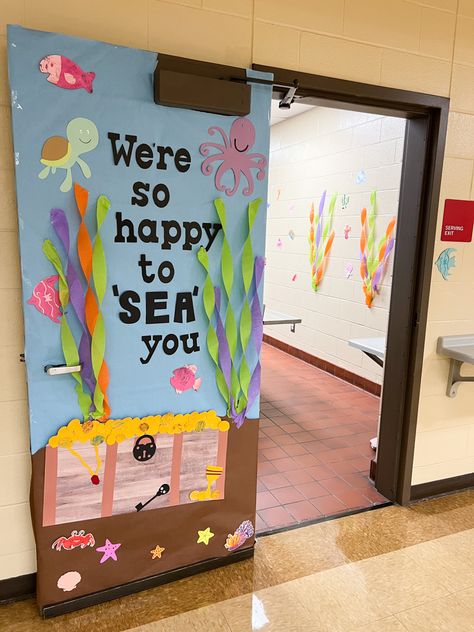 Ocean Themes Classroom, Under The Sea Boards Preschool, Ocean Theme Decor Classroom, Ocean Window Display Classroom, Sea Themed Classroom Door, Water Decorations Classroom, Undersea Classroom Theme, Beach Theme Preschool Classroom, Ocean Welcome Bulletin Board