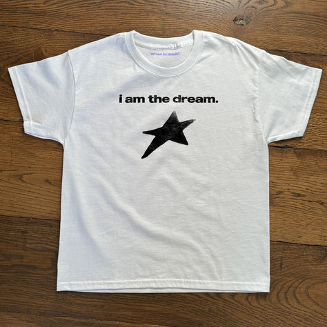 'i am the dream' graphic baby tee Logo Design Clothing Brand, Fall Thrift, Baby Tees 90s, Text Ideas, Graphic Baby Tee, T Shirt Model, Baby Graphic Tees, Tshirt Business, Ideal Wardrobe