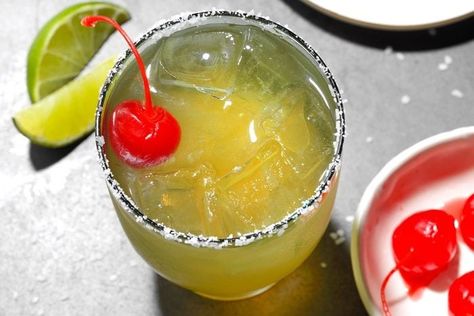 Italian Margarita Recipe: How to Make It Italian Margarita Recipe, Italian Margarita, Lime Drinks, Margarita Recipe, Margarita Recipes, Triple Sec, Maraschino Cherry, On The Rocks, Lime Juice