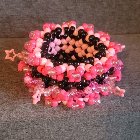 Pink and Black Rotating Spinner Kandi Cuff! This Kandi cuff is handmade by me.  Perfect for accessorizing your festival outfits or any rave outfit, or to add to any awesome Kandi collection!! Check out/follow my socials (@ TicTacToeCreations on FB and IG + linktr.ee/TicTacToeCreations ) for more fun things that haven't been posted on shops yet.  I happily do custom orders of many of the things posted on my socials as well!  💖⭐ Thanks!  🫶PLUR⭐💖 Mini Rotator Cuff Kandi, Kandi Shoe Laces, Plur Bracelets Kandi, Kandi Rotating Cuff Ideas, Epic Kandi Cuff, Cool Kandi Cuff Ideas, Rotating Cuff Kandi, Big Kandi Cuff, Kandi Rotator Cuff