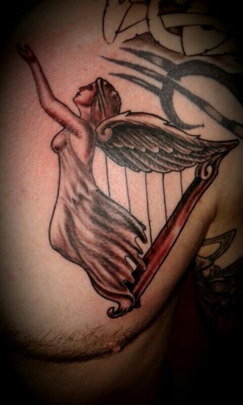 Angel of eire harp. Kinda made it up myself :-) Angel With Harp Tattoo, Harp Tattoo, Angel Playing Harp, Only Angel, Sunset Tattoos, Music Tattoos, Angel Tattoo, Harp, Tattoo Images