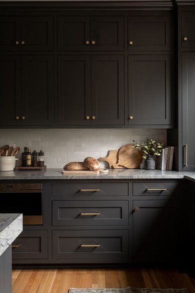 undefined Black Kitchen Base Cabinets, Dark Grey Brown Kitchen Cabinets, Cozy Moody Kitchen, White Kitchen Cabinets With Black Granite, Black Cabinets Wood Countertop, Peppercorn Cabinets Kitchens, Dark Lower Kitchen Cabinets, Dark Cozy Kitchen, Black Cabinets Black Countertops