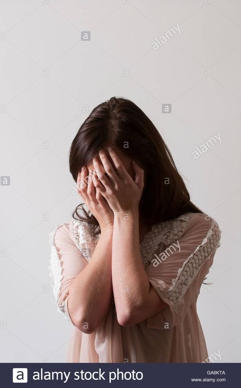 Woman hiding face in hands crying Stock Photo Grabbing Face Pose Reference, Grabbing Someone By The Face Reference, Hand Cover Face Pose, Portrait Hands On Face, Person Grabbing Face Reference, Holding Face In Hands, Hands Covering Face Reference, Hands Pulling Face, Hands Covering Face Drawing Reference