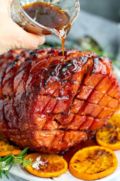 Orange Bourbon Glazed Ham Bourbon Orange Glazed Ham, Apricot Glazed Ham Recipes, Baked Ham With Orange Juice, Cranberry Ham Glaze Recipe, Bourbon Brown Sugar Ham, Orange Marmalade Ham Glaze, Ham Glaze Brown Sugar Orange Juice, Ham Presentation Ideas, Glaze For Smoked Ham