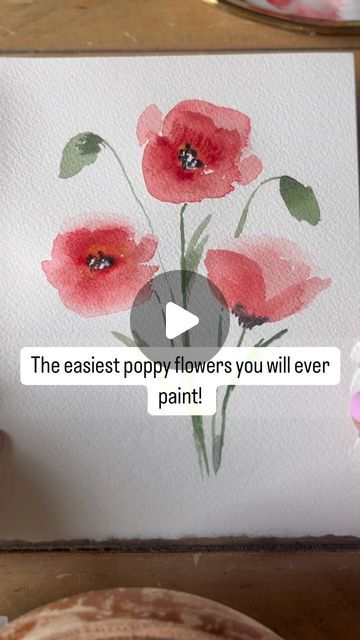 Bree Copley on Instagram: "P O P P I E S ! You will be amazed at how simple and easy it is to paint these poppies. I hope you try it out and experiment with different colors! Did you know there are many different colors of poppies!?! Even black poppies !🤩. Bellow are detailed instructions and a few tips and tricks to help you make these loose watercolor poppy flowers! Steps 1. Load up your brush with a good amount of watercolor. ( you can use an oval brush or small round wash brush ) Make an outline of an oval make sure to leave the center open. This will be the center of your poppy. You can place the oval however you want depending on what way you want your poppy flower facing. 2. Do not rinse your brush, just give it a quick dip in water and use that to drag the color from the o Easy Watercolor Poppies, Poppy Watercolor Painting Simple, How To Paint A Poppy Flower Step By Step, Painting Poppies Easy, Watercolor Poppies Tutorial Step By Step, Watercolour Poppy Tutorial, How To Paint A Poppy, Poppy Watercolor Tutorial, Poppy Painting Easy