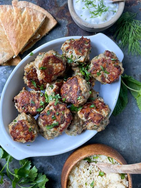 These easy chicken kofta meatballs are the perfect weeknight meal, as they come together in under 30 minutes. They are kid and hubby approved and gluten-free and dairy-free to boot!  You can even make these meatballs up ahead of time, refrigerate them and then cook them up come dinner time. They only take 10 minutes to bake! How awesome is that? Turkey Kofta Recipe, Chicken Kafta Recipe, Chicken Kefta, Chicken Kafta, Chicken Koftas, Chicken Kofta Recipe, Turkey Kofta, Kofta Meatballs, Chicken Kofta