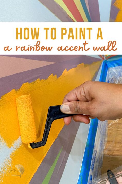 Not your traditional rainbow accent wall! Paint it in a corner. Use colors that match the room decor for a colorful sunburst rainbow accent wall that is modern and fun! #anikasdiylife Multi Colored Accent Wall, Playroom Wall Paint Ideas, Rainbow Mural Kids Room Diy, Rainbow Paint Wall, Rainbow Painted Walls, Rainbow Wall Paint, Playroom Accent Wall, Rainbow Accent Wall, Diy Accent Wall Paint