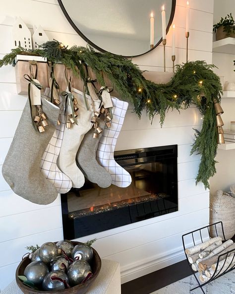 Christmas Tv Stand Garland, Christmas Garland Over Fireplace, Farmhouse Mantle Garland, Christmas Mantle Decor With Bells, Large Mantel Christmas Decor, Mantle With Garland And Stocking, Christmas Mantel Minimalist, Floating Garland Above Table, Stockings By Fireplace