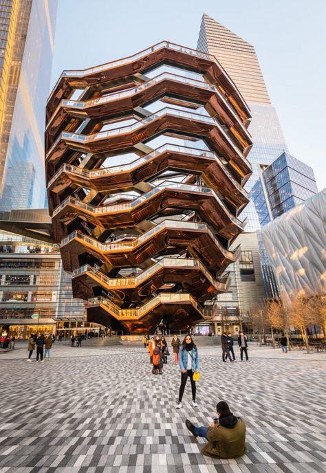 The plaza surrounding The Vessel is a popular spot to photograph portraits. New York Hudson Yards, Vessel Nyc, Nyc Study, Hudson Yards Nyc, Photographie New York, Nyc Buildings, Nyc Architecture, Thomas Heatherwick, Dancing House