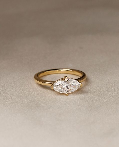 ✨East-West Marquise Solitaire✨⁠ ⁠ An east-west engagement ring is a distinctive design in which the gemstone is set horizontally across the band rather than in the traditional vertical (North-South) orientation. ⁠ ⁠ We're kinda obsessed!⁠ ⁠ Details:⁠ River - East West Marquise Solitaire 1.51ct | E | VS1⁠ ⁠ Vertical Diamond Ring, East West Moissanite Engagement Ring, Marquise Diamond Ring East West, Marquise Engagement Ring East West, East West Setting Engagement Ring, Horizontal Marquise Ring, Horizontal Set Engagement Ring, Marquise East West Engagement Ring, Horizontal Marquise Engagement Ring