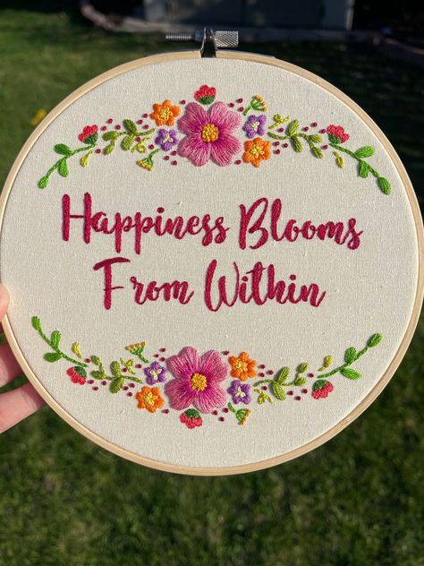 A 7" hand sewn embroidery hoop. Has a floral design with the quote "Happiness Blooms From Within". The back is closed off felt. Hand Embroidery Quotes, Flower Embroidery Hoop, Embroidery Quotes, Quotes Embroidery, Mom Embroidery, Quote Embroidery, Quote Happiness, Embroidery Hoop Art Diy, Flower Background Images