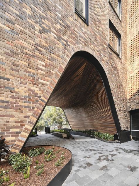 DKO, Breathe complete Australia's largest recycled brick building | ArchitectureAU Recycled Brick, Building Entrance, Roof Architecture, Industrial Architecture, Architecture Ideas, Brick Architecture, Entrance Design, Dance School, Brick Facade