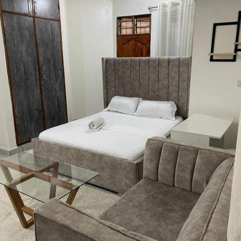 Tulivu Studio Apartment in Bamburi Mombasa is located in Mombasa, just 1.6 miles from Kenyatta Public Beach and 2.2 miles from Haller Park. This property offers access to a balcony and free private parking. The accommodation features full-day security and a mini-market for guests. With free Wifi, this 1-bedroom apartment offers a flat-screen TV and a kitchen with a microwave and fridge. The property offers quiet street views. A bicycle rental service is available at the apartment. Nyali Golf Cou Bedsitter Ideas Small Spaces, Bedsitter Ideas Small Spaces Kenya, Bedsitter Ideas, Mombasa Kenya, Mini Market, Studio Apartments, Mombasa, Small Apartment Living, 1 Bedroom Apartment