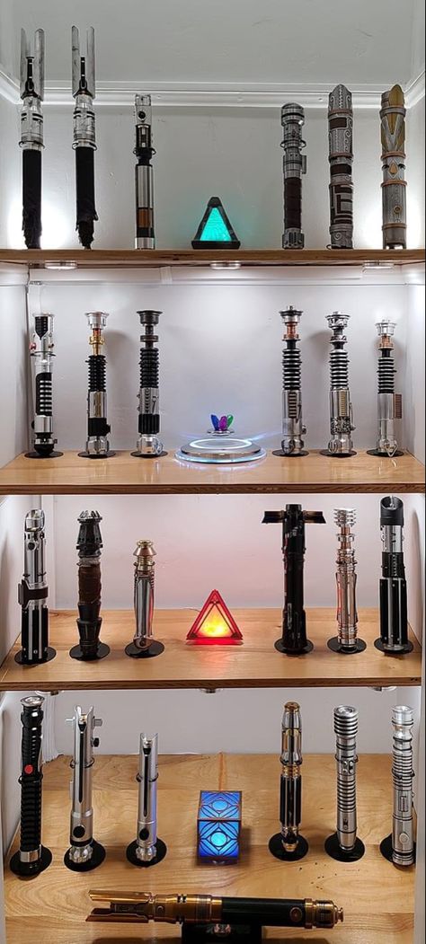 #lightsaber #kybercrystal #holocron #starwars Depa Billaba Lightsaber, Lightsaber Collection Display, Lightsaber Display Wall, Lightsaber Display Ideas, Nerdy House Decor, Custom Lightsaber Hilt Design, Star Wars Prop, Star Wars Lightsaber Designs, Lightsabers Design