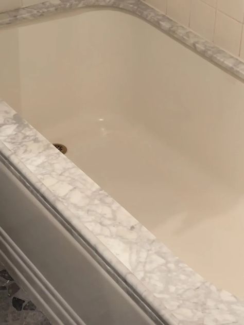 How a Renter Fixed Her Leaky Shower-Tub with a $12 Tilebar Find Peel And Stick Tub Surround, Tub Surround Ideas Cheap, Diy Tub Skirt, Tub Shower Combo Remodel, Shower Transformation, Tub Skirt, Old Bathtub, Bathtub Surround, Marble Tub