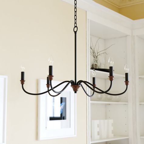 Six sweeping outstretched arms grace this ceiling mounted chandelier with the utmost class. Simple yet elegant, the Annabelle is understated, but easily becomes the conversation piece in the room. Black Farmhouse Chandelier, Black Farmhouse, Candelabra Chandeliers, Classic Chandelier, Single Candle, Wagon Wheel Chandelier, Farmhouse Chandelier, Room Lighting, Farmhouse Lighting