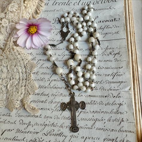 Vintage Lourdes souvenir rosary with white glass beads. https://vintagesupplyco.etsy.com/listing/1793259310 #VintageRosary #FrenchRosary #LourdesRosary #AntiqueRosary #ReligiousAntiques #FrenchReligiousArt #CatholicRosary #VintageRelics #SacredCollectibles #LourdesSouvenir #PrayerBeads #VintageDevotion #FrenchTreasures #HolyRosary #RosaryCollector Holy Rosary, Rosary Catholic, Prayer Beads, Religious Art, Rosary, White Glass, Glass Beads, Beads, Glass