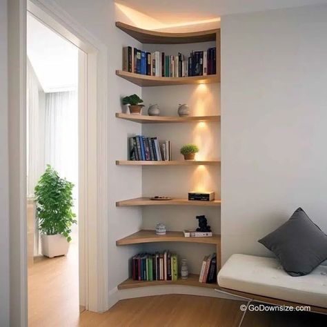 This traditional home showcases radial corner shelves that store books and puts them on a classy display. Book Shelves In Bedroom, Corner Shelves Bedroom, Home Office Built Ins, Corner Wall Shelves, Corner Bookshelves, Small Home Offices, Store Books, Shelving Design, Corner Storage